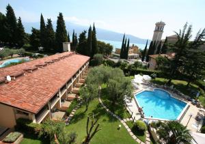 an overhead view of a resort with a swimming pool at Hotel Adria & Resort in Toscolano Maderno