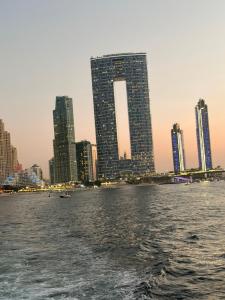 a view of a city from the water with buildings at Studio Mas Pierre in Maureillas