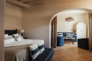 Llit o llits en una habitació de La Piazza Hotel - Porto Rafael