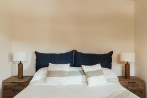 Llit o llits en una habitació de La Piazza Hotel - Porto Rafael