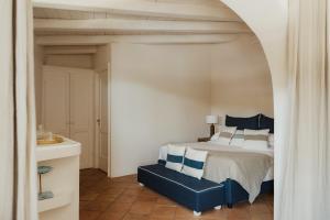Llit o llits en una habitació de La Piazza Hotel - Porto Rafael