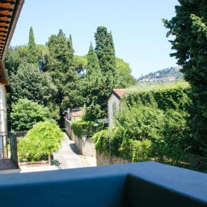 a view from the balcony of a house with trees at AF51 Florence Apartment in Florence