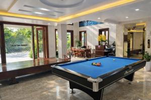 a billiard room with a pool table in a house at Phương Anh Villa 1 in Bắc Ninh