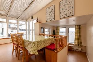 a dining room with a table and chairs at Appleton House - Lower Largo in Lower Largo