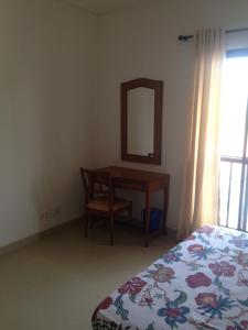 Ένα ή περισσότερα κρεβάτια σε δωμάτιο στο Studio and One bedroom Apartment in Riviera Sapphire, Siolim