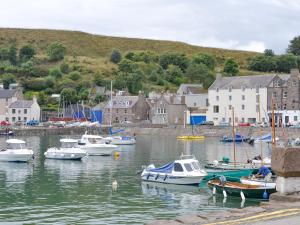 a group of boats docked in a body of water at Toab - Uk5662 in Aberdeen