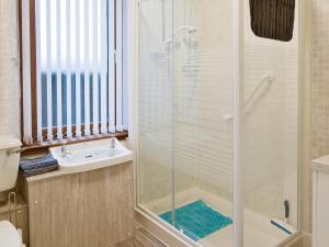a bathroom with a shower and a sink at Bankfield - Uk5660 in Aberdeen