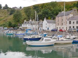 a group of boats are docked in a harbor at Bankfield - Uk5660 in Aberdeen