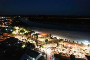 an aerial view of a beach at night at Pousada Le Sorelle apt05 in Rosário do Sul