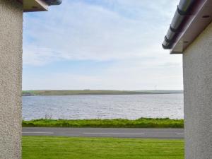 a view of a large body of water from a window at Rockworks Chalets No2 - Uk7041 in Saint Marys +6 photos