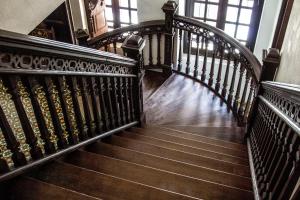 a staircase in a building with a stair case at Museum Hotel in George Town