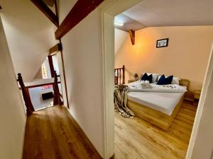 a bedroom with a bed in a room at OLD TOWN Palatul Agoston Galgon in Timişoara