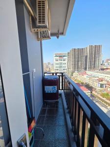 a balcony with a view of a city at L Residence 2 BTB in Phnom Penh