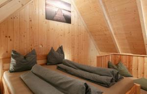 a room with two pillows on a bed in a attic at Chalet In Stainz in Stainz