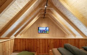 a room with a roof with a tv in it at Chalet In Stainz in Stainz +24 photos