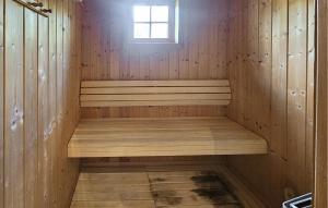 a sauna with a bench in a wooden cabin at Gorgeous Home In Eggedal With Sauna in Eggedal