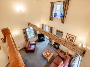 an overhead view of a living room with a staircase at The Hayloft - 17238 in York