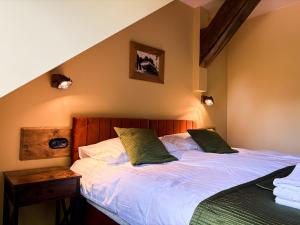 a bedroom with two twin beds at Dymer in Biskupiec
