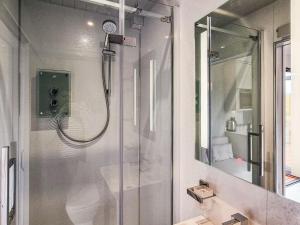 a shower in a bathroom with a glass door at The Pod - Uk38513 in Babcary +8 photos