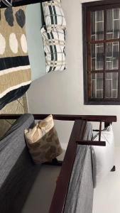 a room with two bunk beds and a mirror at Casa do Cleber in Matinhos
