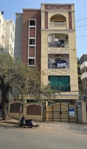 a motorcycle parked in front of a building at Crystal Mansion in Hyderabad