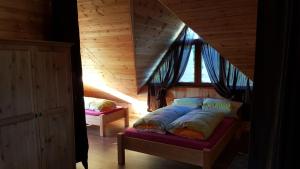 Ένα ή περισσότερα κρεβάτια σε δωμάτιο στο Ferienhaus ALhaus