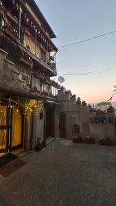 a building with a sunset in the background at Casa in Piazzetta in Zagarolo