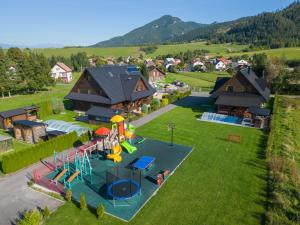 an aerial view of a park with a playground at Drevenica pod Sitieňom 2 in Svätý Kríž