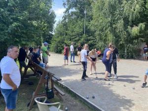 a group of people playing a game of dominoes at ZEcamping 4 étoiles piscine couverte piscine chauffée locatif 4 pers in Wavans