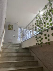 a staircase in a house with a glass railing at Park Hotel in Quba +44 photos