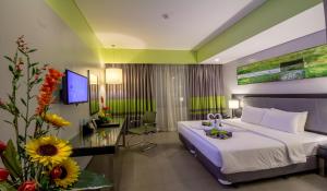 Televiisor ja/või meelelahutuskeskus majutusasutuses Bayfront Hotel Cebu North Reclamation
