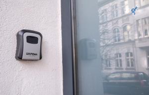 a door opener on the side of a window at BEGE APARTMENTS LoftWork in Lüdenscheid