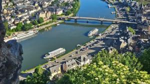 an aerial view of a river with a bridge at Ferienwohnungen Bongarden in Bernkastel-Kues +3 photos