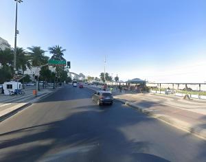 a car is driving down a city street at 360 Copa Galeria Ritz By SUHCasa in Rio de Janeiro
