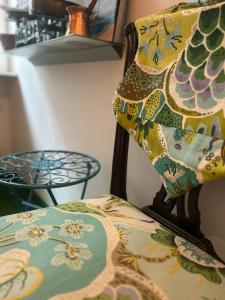 a close up of a pillow on a chair at Pension Stadthalle in Vienna