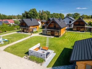 an aerial view of a house with a yard at Siedlisko Malechowo in Ustronie Morskie