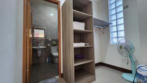 a bathroom with a toilet and a sink at Dongle B&B in Taitung City +24 photos