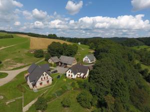 an aerial view of a house in the middle of a field at Selský dvůr 2 in Police nad Metují
