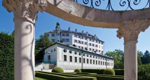 a large white building with a tower on top of it at Hotel Goldener Adler, BW Signature Collection in Innsbruck