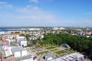 an aerial view of a city with buildings and trees at Residenzen am Kirchenplatz in Warnemünde