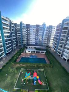 an aerial view of a large apartment complex with a playground at Ww homes 2bedroom Apartment in Nairobi