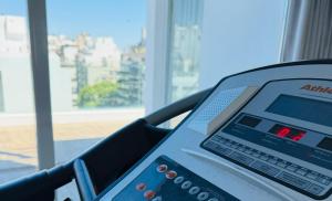 an atm machine in a room with a window at Hotel Gema Luxury Suites in Montevideo +53 photos