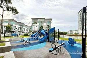 a playground in front of a building at Retro Game - D'Lagoon Sri Austin By iH Home in Kempas