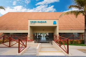 a building with a sign that reads gas amanamt at Casa Andina Select Zorritos Tumbes in Zorritos