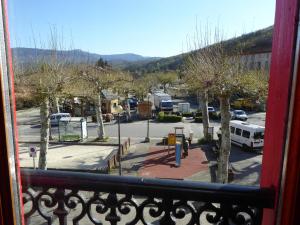 a view of a parking lot from a balcony at Auberge l'Escaleta in Seix