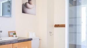a bathroom with a sink and a toilet at Crummock at the Graythwaite Estate in Sawrey +17 photos