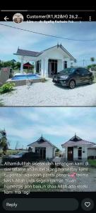 two pictures of a house with a car in front at CC Roomstay Kampung Mangkuk, Terengganu in Setiu +7 photos
