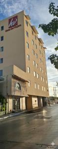 a building with a sign on the side of it at Hotel Del Viajero in Ciudad del Carmen