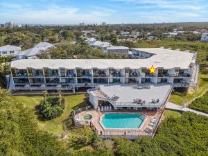 an aerial view of a resort with a swimming pool at Marker 33 #2D3 in New Smyrna Beach