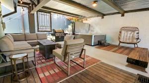 a living room with a couch and a tv at Summit Home Multi-level with PC Views Ski Trail in Park City +33 photos